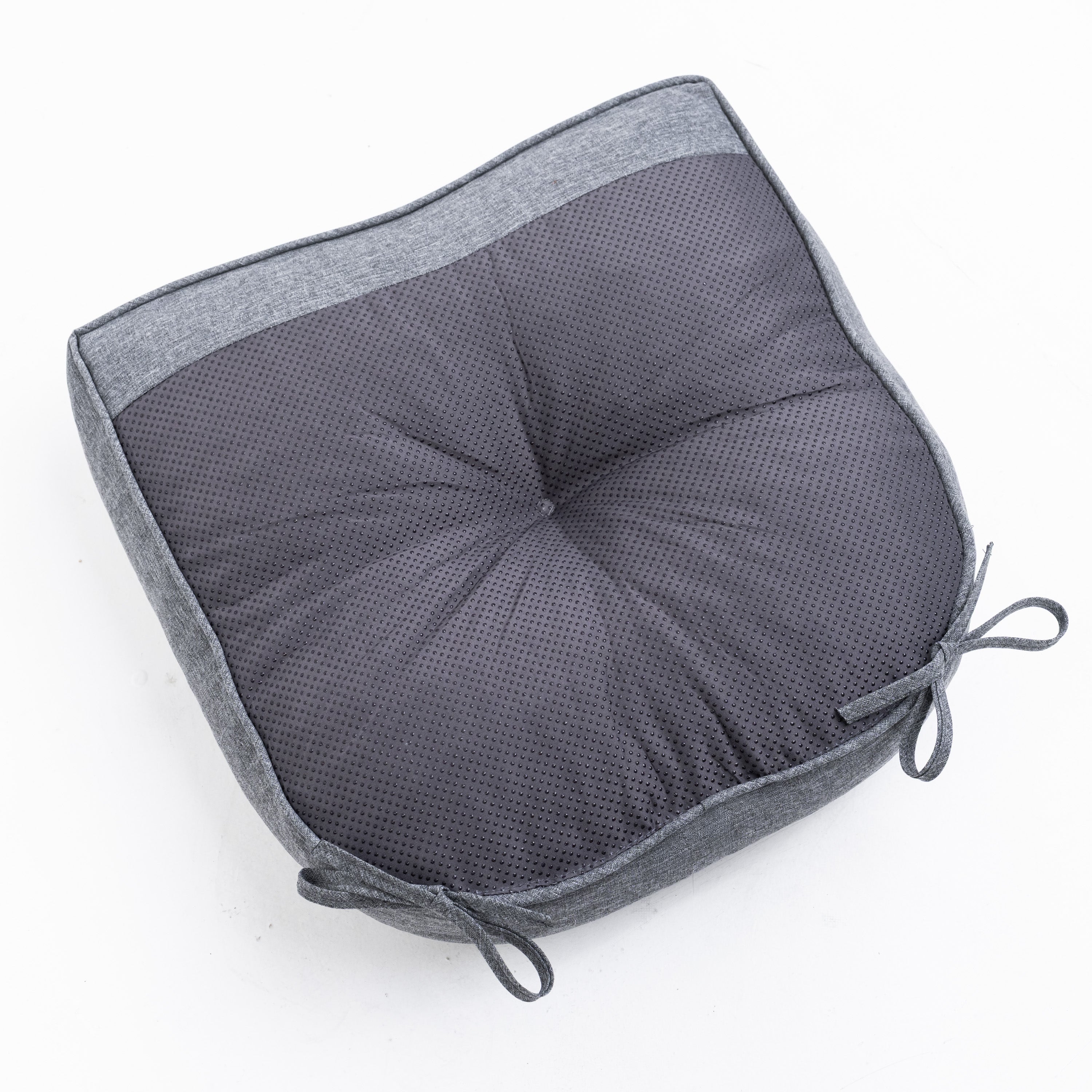 A square gray cushion with a textured mesh center and a solid heather gray fabric border, featuring tie-on corner straps, shown on a plain white background.