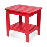 A bright red outdoor side table with a slatted top and lower shelf, shown on a clean white background. 