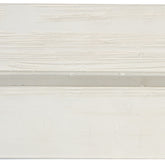 A close-up of a white textured surface with horizontal brushstroke patterns and a subtle horizontal seam or edge. 