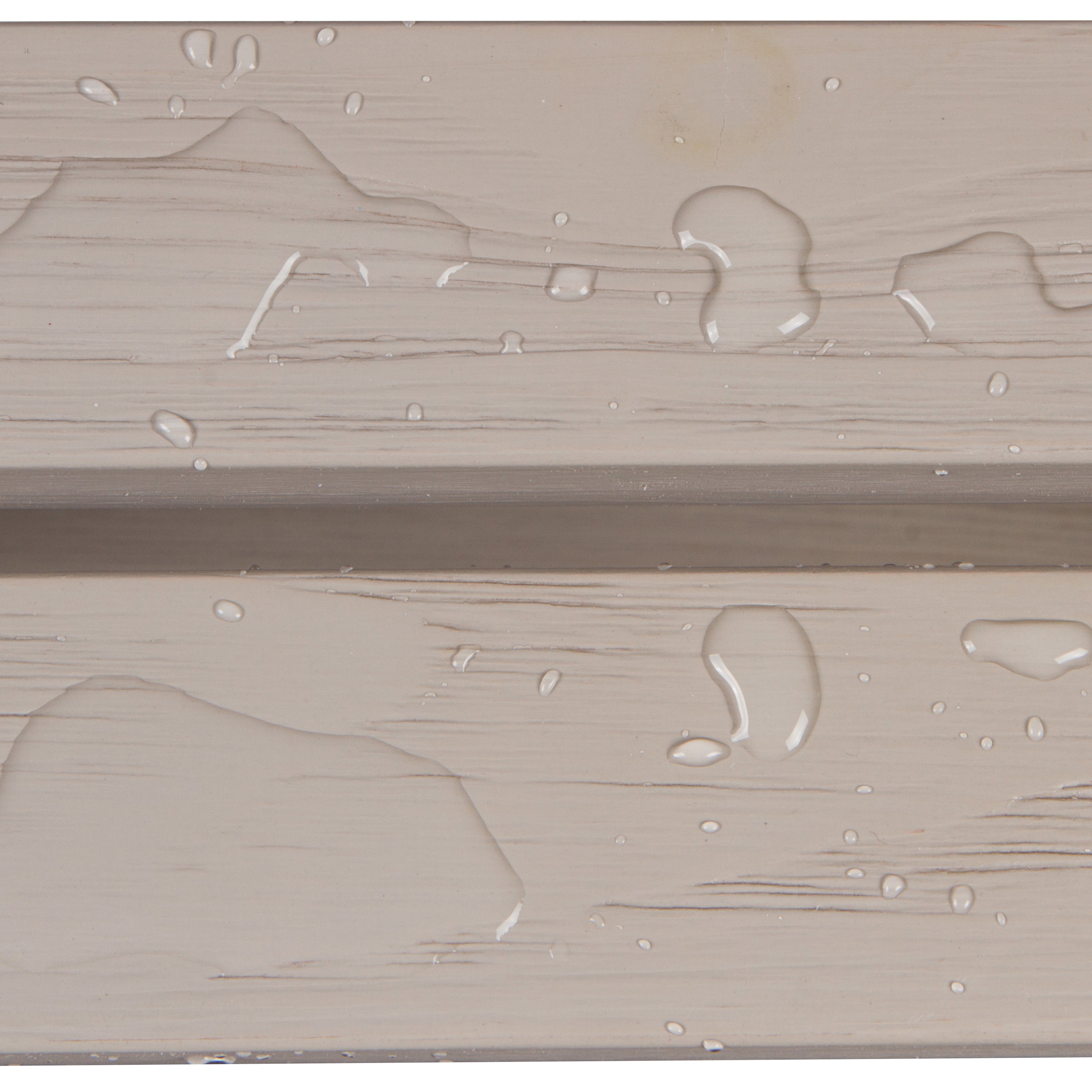 Close-up of a beige wood-textured surface with water droplets and a horizontal seam. 