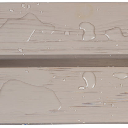 Close-up of a beige wood-textured surface with water droplets and a horizontal seam. 