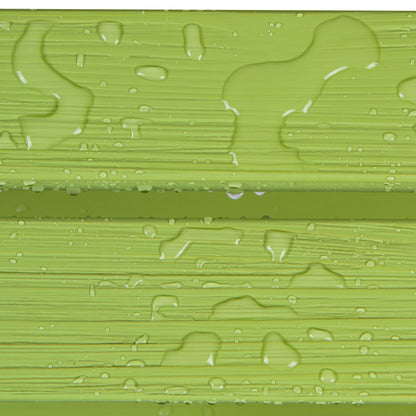 Close-up of a glossy light green textured surface with water droplets and horizontal ridges. 
