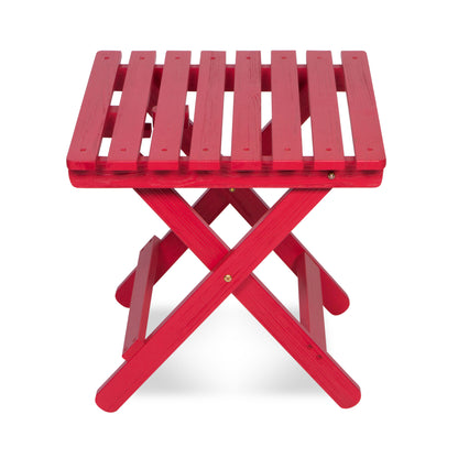 A bright red folding wooden side table with a slatted top and X-frame legs, shown on a clean white background. 