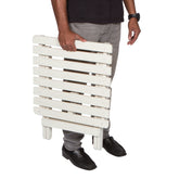 Person holding a white folding table on a white background 