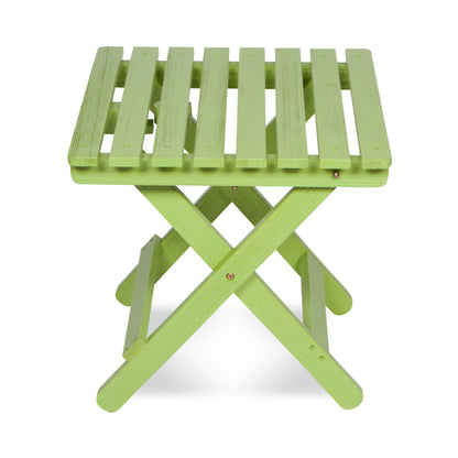 A lime green folding wooden side table with a slatted top and X-frame legs, shown on a white background. 