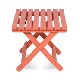 A small folding side table with a square slatted top and X-shaped legs, shown on a clean white background. 