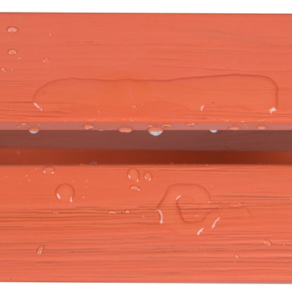 Close-up of a terracotta orange textured surface with water droplets and a water droplet beading up along the edge, demonstrating a waterproof or hydrophobic finish. 