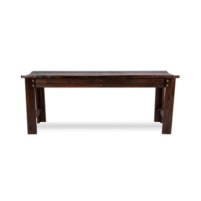 A dark brown wooden dining bench with a rustic plank top and four sturdy legs, shown against a plain white background. 