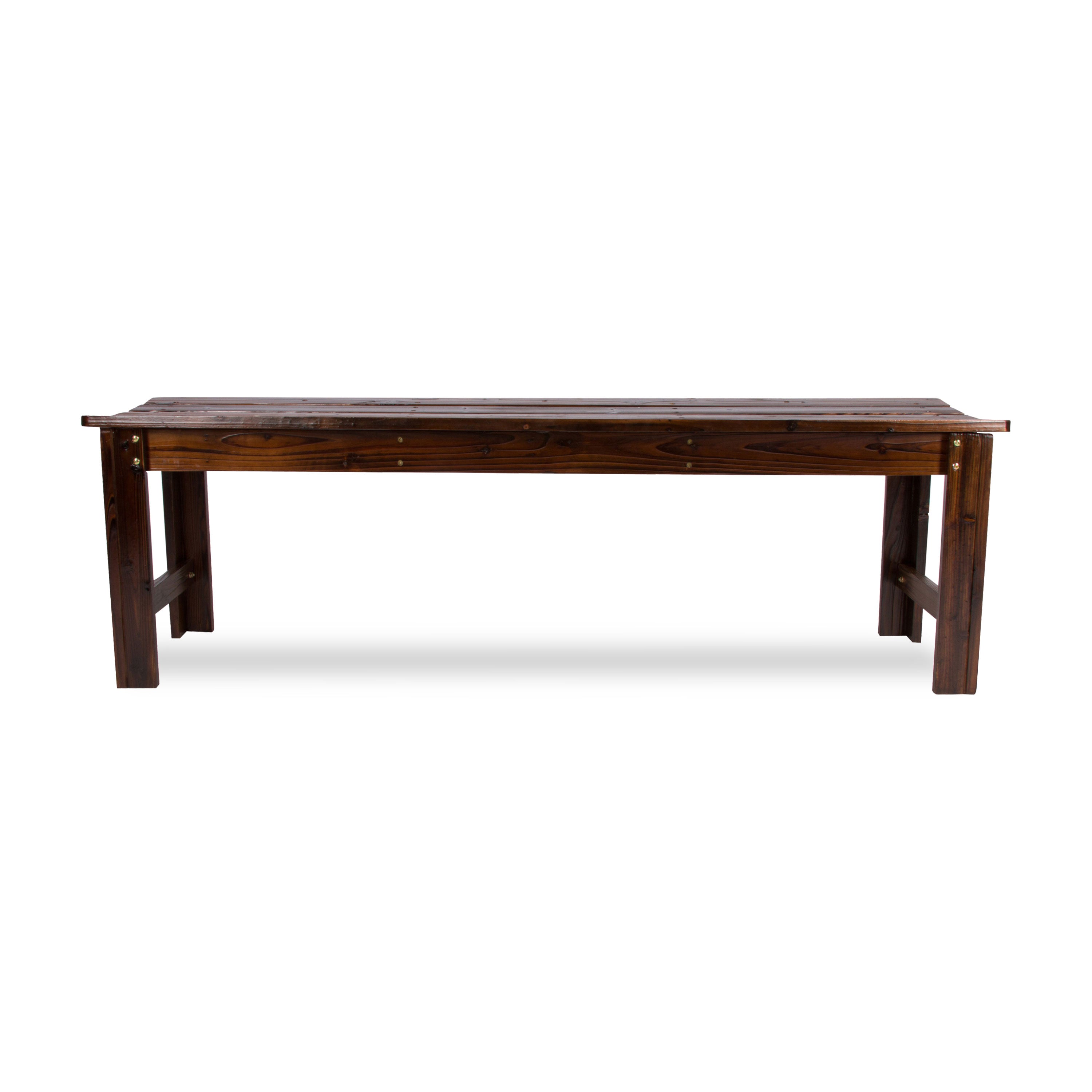A dark brown wooden bench with a slatted seat and trestle-style legs, shown from the side against a plain white background. 