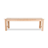A light natural wood bench with a rectangular top and four legs, shown from a front angle on a white background.  