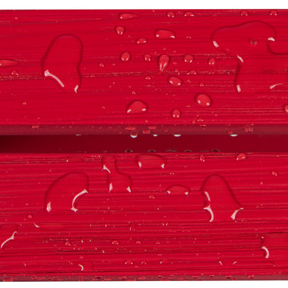 Close-up of glossy red textured material with water droplets on the surface. 