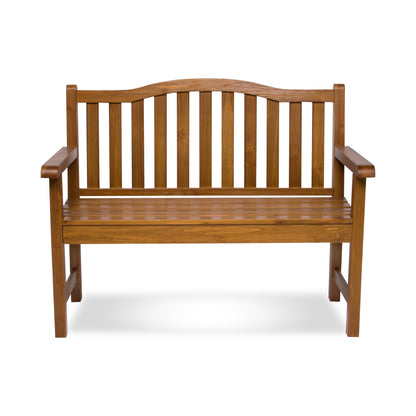 A wooden garden bench with a slatted backrest, curved top rail, and armrests, shown on a plain white background. 