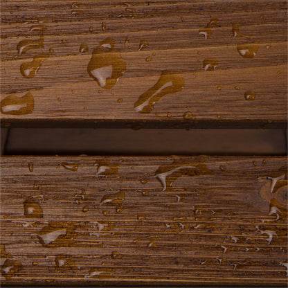 Close-up of a brown wood-grain textured surface with water droplets and a horizontal slot or groove running through the center. 