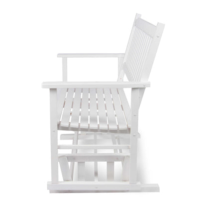 A white wooden rocking chair with a slatted backrest and seat, shown from a side angle against a plain white background. 