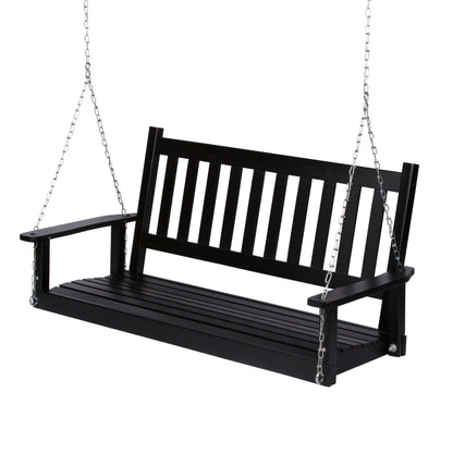 A black wooden porch swing bench suspended by silver metal chains against a plain white background. 