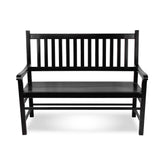 A black wooden garden bench with a slatted backrest and armrests, shown from the front on a white background. 