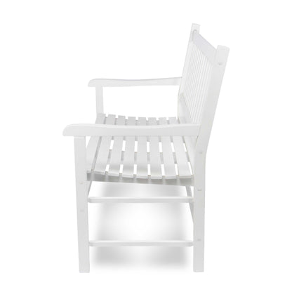 A white wooden slat bench with armrests and a tall slatted back, shown from the side against a plain white background. 