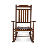 A classic wooden rocking chair with a dark brown finish, featuring a slatted backrest and seat, shown against a plain white background. 
