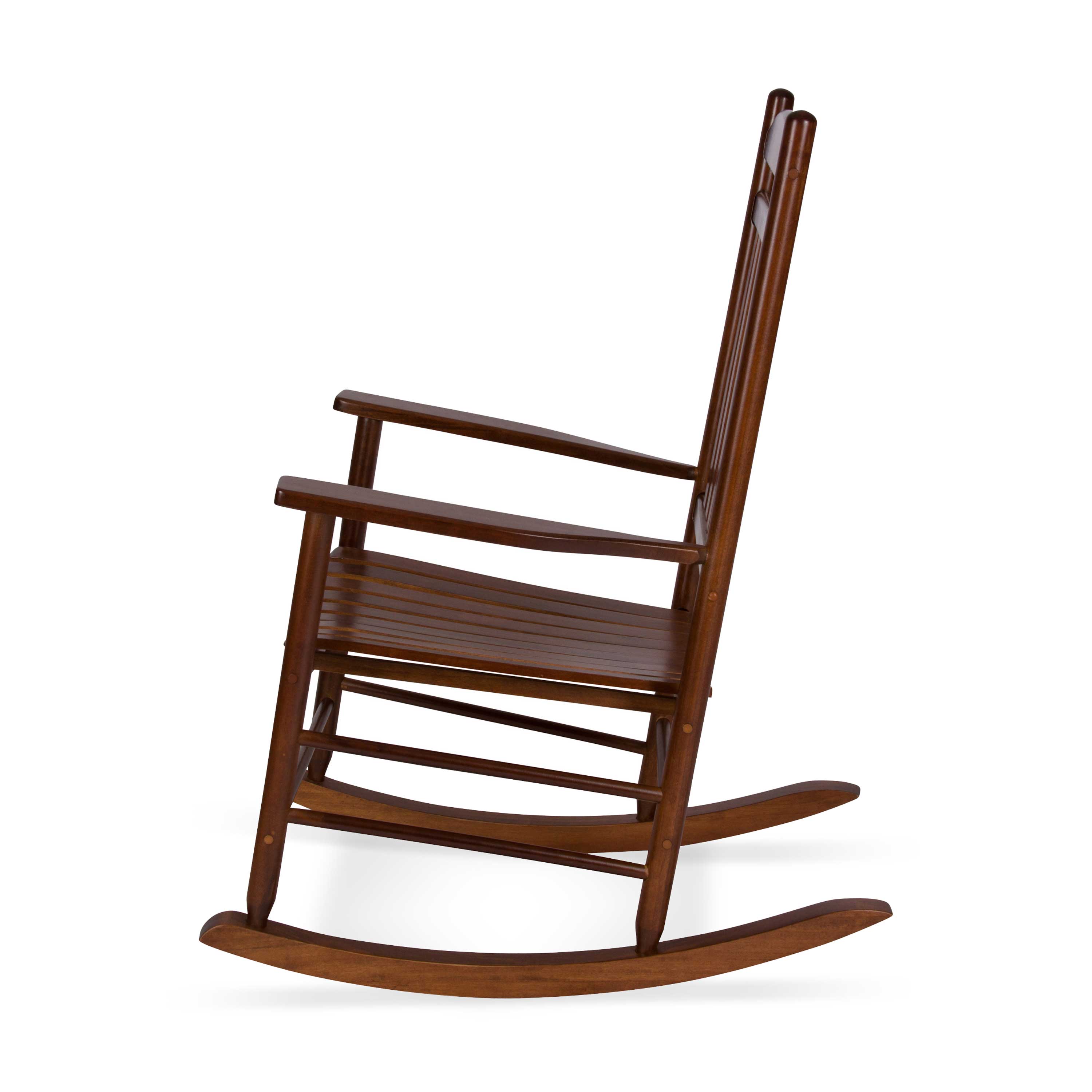 A classic wooden rocking chair in a warm brown finish, shown from a side profile view against a plain white background. 