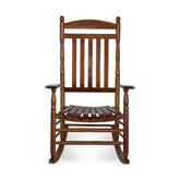 A classic wooden rocking chair with a warm brown finish, featuring a slatted backrest, armrests, and curved rocking legs, shown against a plain white background. 