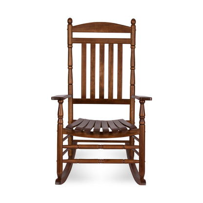 A classic wooden rocking chair with a warm brown finish, featuring a slatted backrest, armrests, and curved rocking legs, shown against a plain white background. 