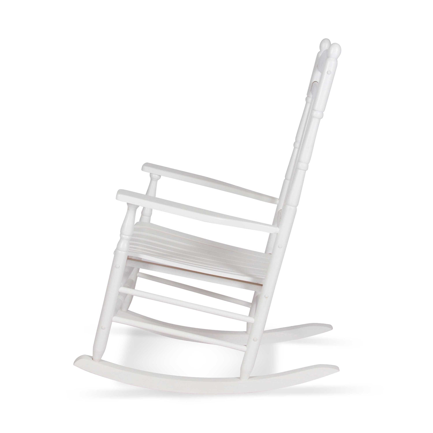 A classic white wooden rocking chair shown from a three-quarters angle against a solid white background. 