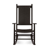 A black rocking chair with a woven wicker-style backrest and seat, shown from the front against a plain white background. 