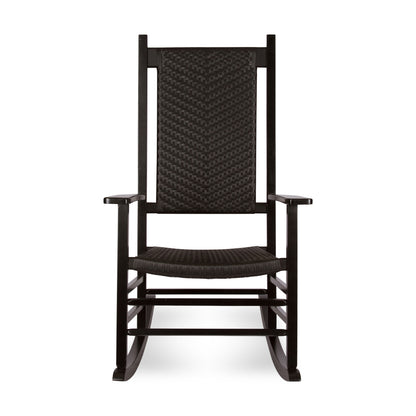 A black rocking chair with a woven wicker-style backrest and seat, shown from the front against a plain white background. 