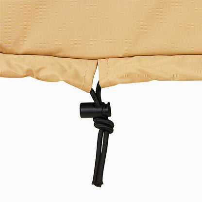 Close-up of beige fabric with a black cord and knot on a white background 