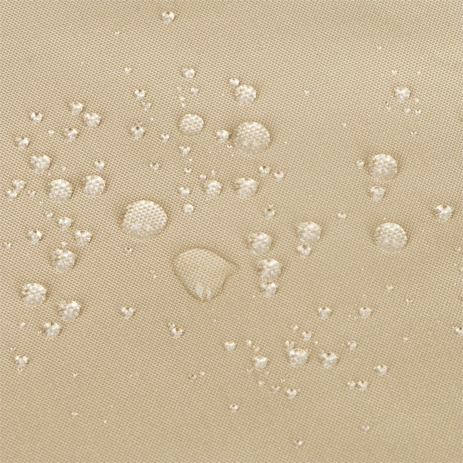 Close-up of a khaki textured fabric surface with clear water droplets beaded on top, demonstrating a water-repellent or waterproof finish. 