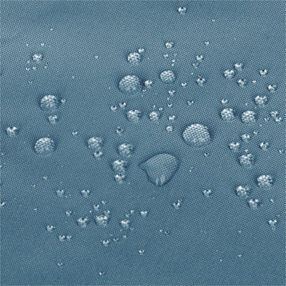 Close-up of a textured blue fabric surface with scattered clear water droplets showing a water-repellent  effect. 