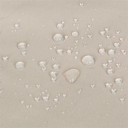 Close-up of a khaki woven fabric surface with multiple clear water droplets resting on top, showing a water-repellent or hydrophobic effect. 