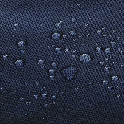 Close-up of a dark navy blue textured fabric surface with multiple water droplets resting on it. 