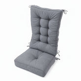 A gray tufted outdoor chair cushion set with a tall backrest and a matching seat cushion, shown on a plain white background. 