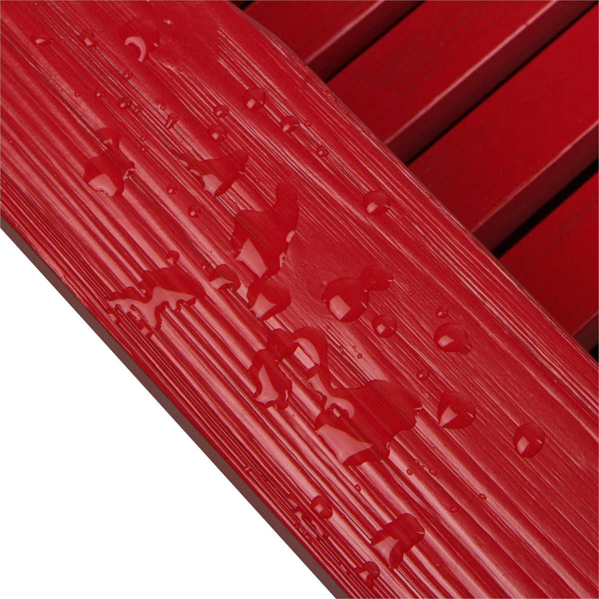Close-up of armrest showcasing the glossy, water resistant paint finish for red Adirondack chair. 