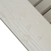Close-up of a eggshell white armrest showcasing the glossy, water resistant finish for Adirondack chair. 