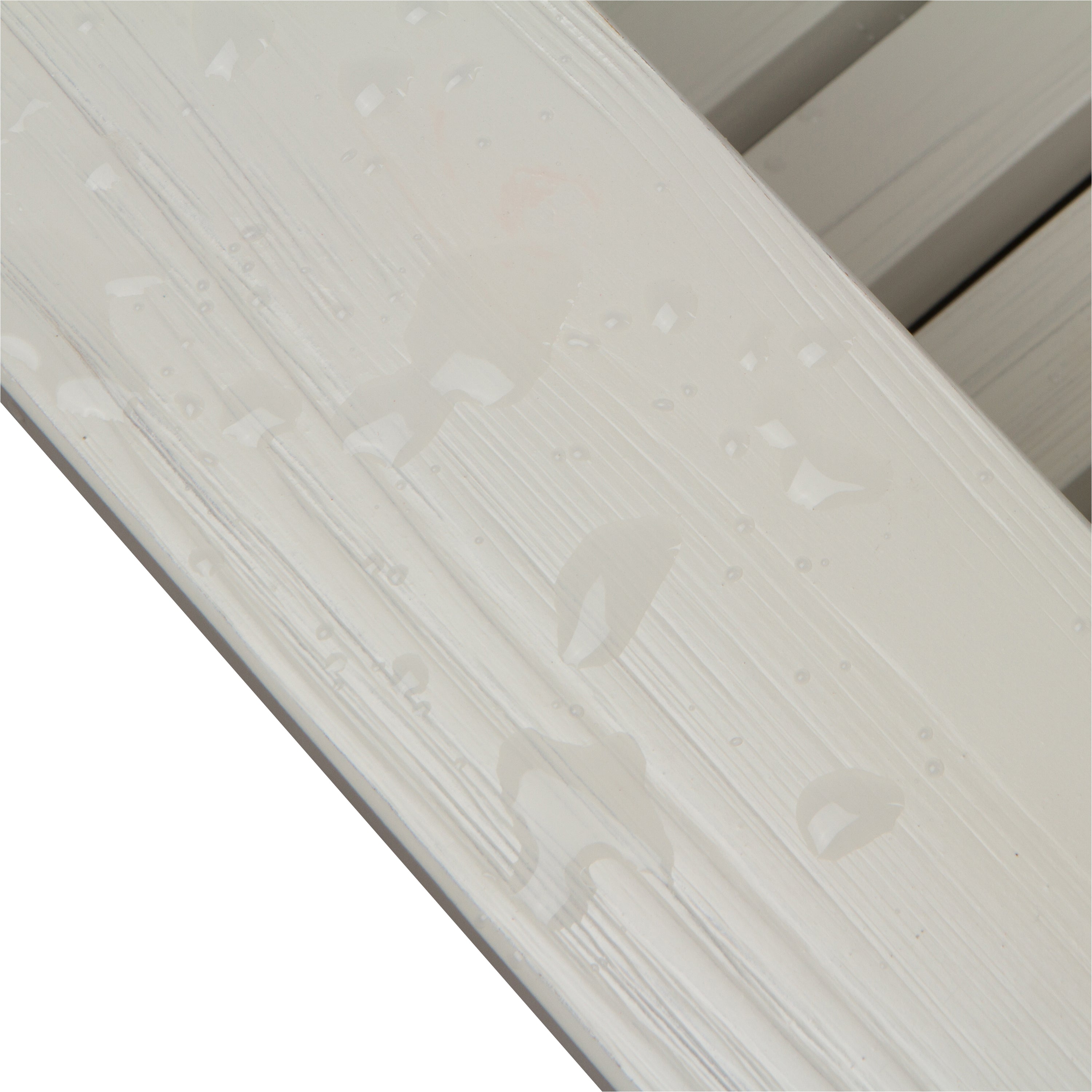 Close-up of a eggshell white armrest showcasing the glossy, water resistant finish for Adirondack chair. 