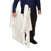 Person holding a white folding gate against a white background 
