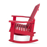 A bright red wooden Adirondack-style rocking chair shown from a side angle against a plain white background. 