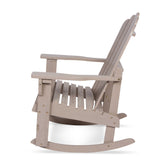 A light taupe Adirondack-style rocking chair shown from a side angle against a plain white background. 