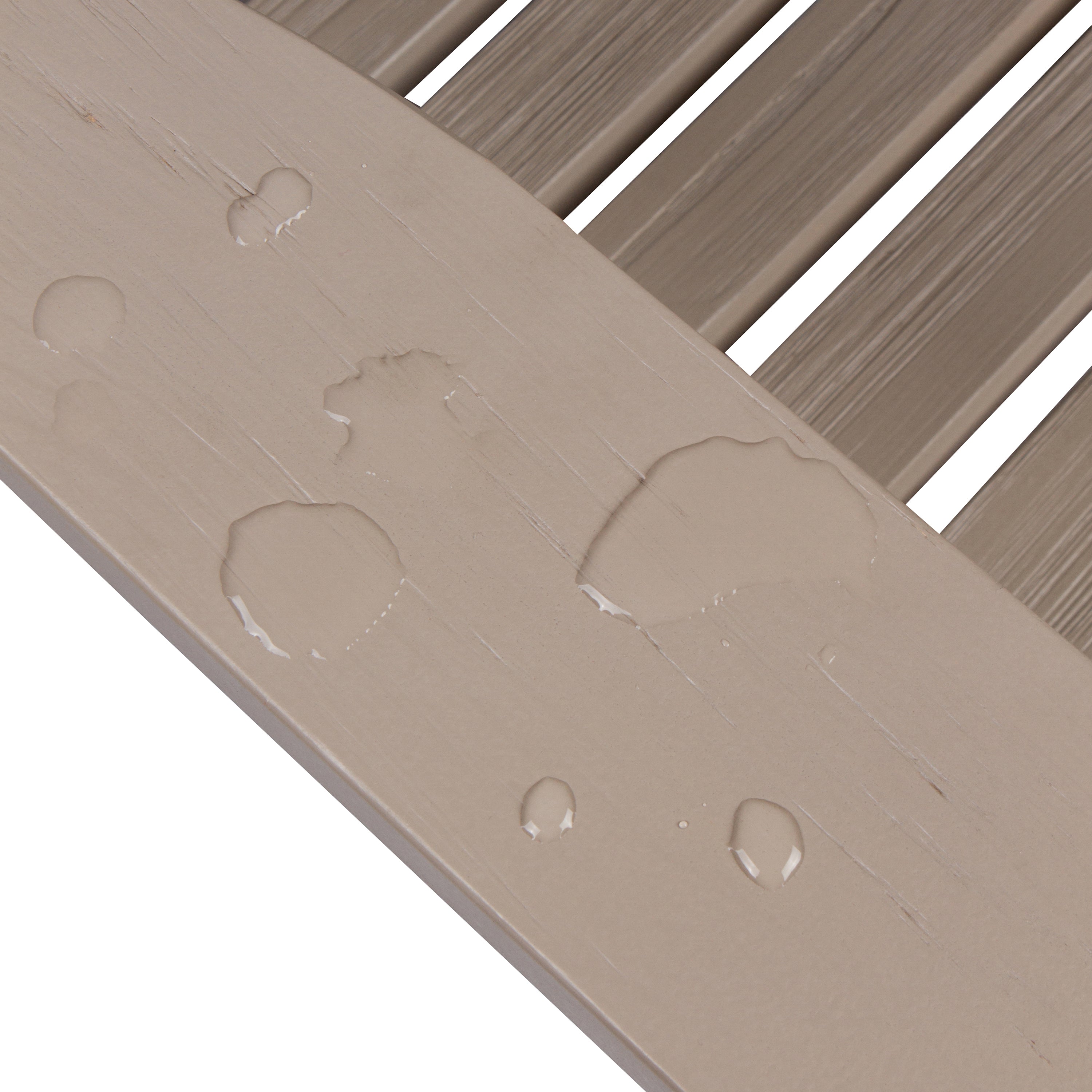 Close-up of a beige slatted surface with water droplets beading on the top rail, showing a waterproof or water-repellent finish against a white background. 