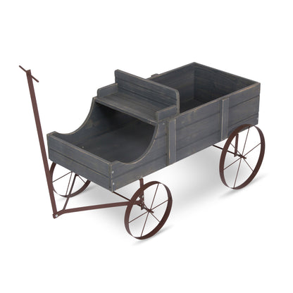 A rustic wooden display cart with a dark gray weathered finish, featuring a step-up rear platform and a brown metal wheeled frame with a handle.  