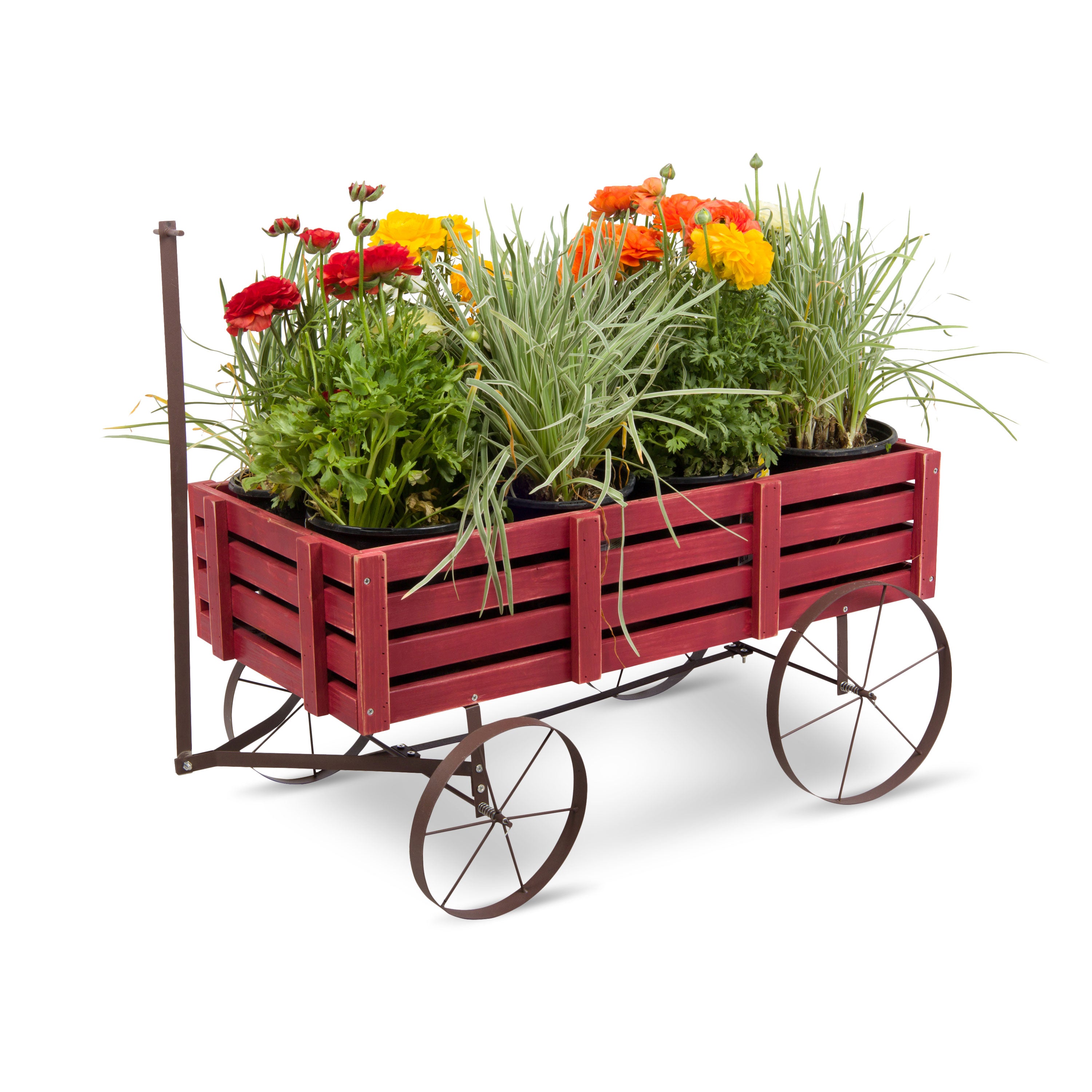 A red wooden slat planter wagon with dark metal wheels and a handle, filled with green plants and colorful flowers including red, orange, and yellow blooms, photographed on a white background. 