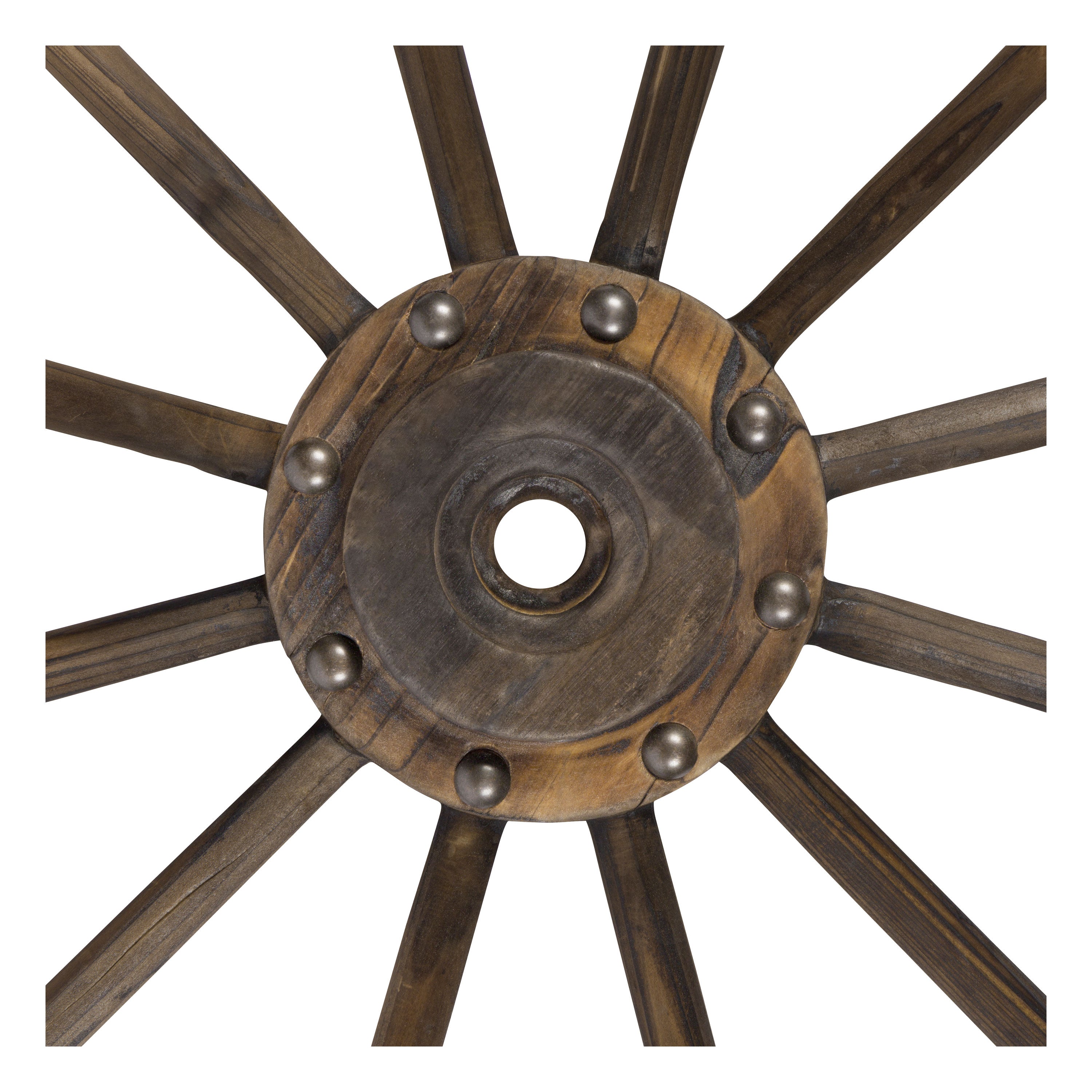 A rustic wooden wagon wheel wall decor piece with dark brown spokes and a central round hub accented by small metallic studs, shown against a plain white background. 