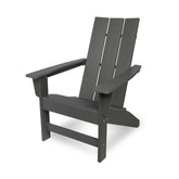 A dark gray Adirondack-style outdoor chair with a high slatted back, wide armrests, and a slanted footrest, shown on a clean white background. 