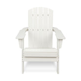 A white Adirondack-style outdoor chair with a slatted back, wide armrests, and a cushioned seat, shown against a plain white background. 