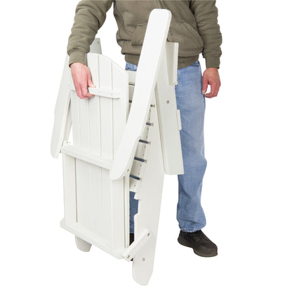 A person in a brown hoodie, blue jeans, and black shoes is holding a white folding patio chair against a plain white background. 
