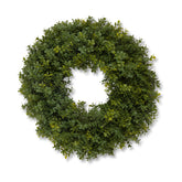 An artificial green boxwood leafy wreath with realistic dense foliage, shown against a plain white background.