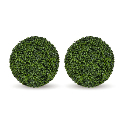 Two round green artificial topiary ball decorations on a plain white background.
